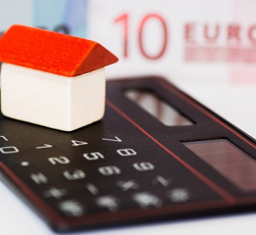 Haus - Geld - Taschenrechner